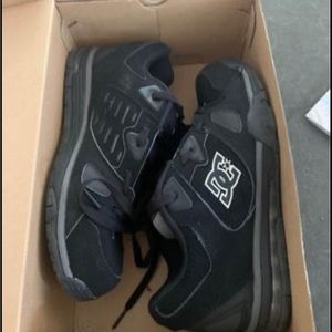 Dc sneakers , laced up worn twice and for show . Brand new